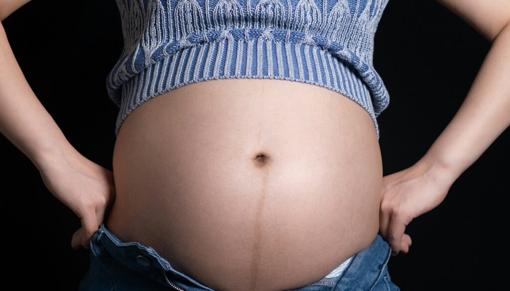 Barriga de gestante (Crédito: Anky Lau/Unsplash)