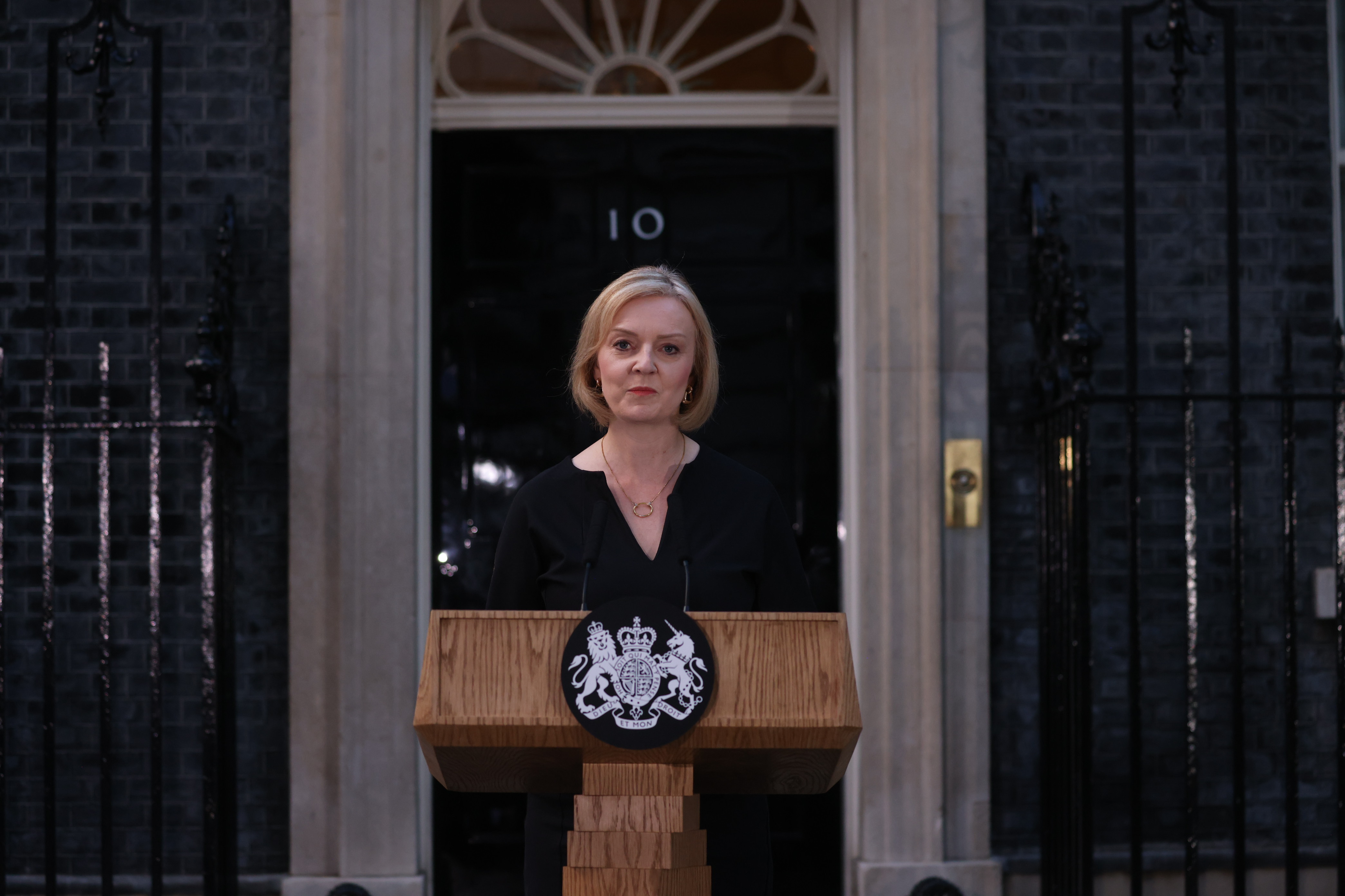 LONDON, ENGLAND - SEPTEMBER 08: Prime Minister Liz Truss makes a statement outside 10 Downing Street following the death of Queen Elizabeth II on September 08, 2022 in London, England. Elizabeth Alexandra Mary Windsor was born in Bruton Street, Mayfair, London on 21 April 1926. She married Prince Philip in 1947 and acceded the throne of the United Kingdom and Commonwealth on 6 February 1952 after the death of her Father, King George VI. Queen Elizabeth II died at Balmoral Castle in Scotland on September 8, 2022, and is survived by her four children, Charles, Prince of Wales, Anne, Princess Royal, Andrew, Duke Of York and Edward, Duke of Wessex. (Photo by Dan Kitwood/Getty Images)